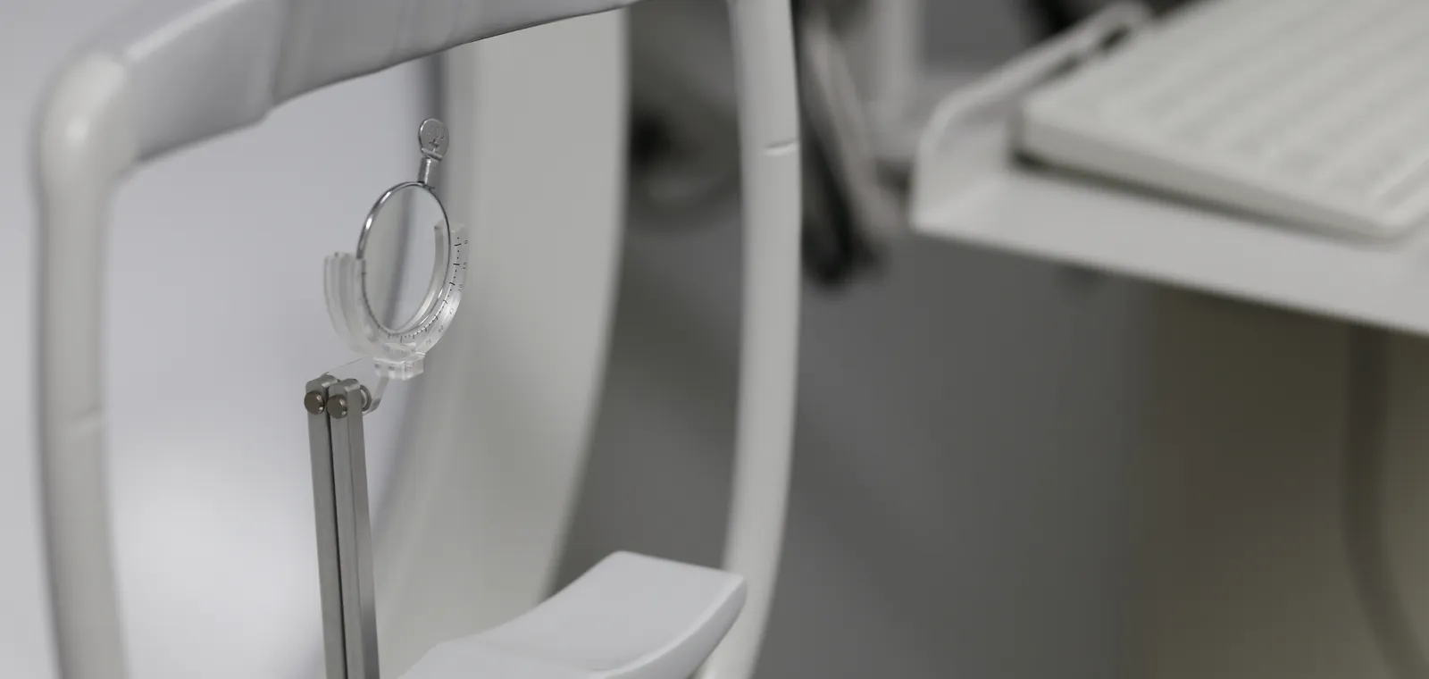 Optometrist performing an eye examination at Outlook Eye Centre Toowoomba