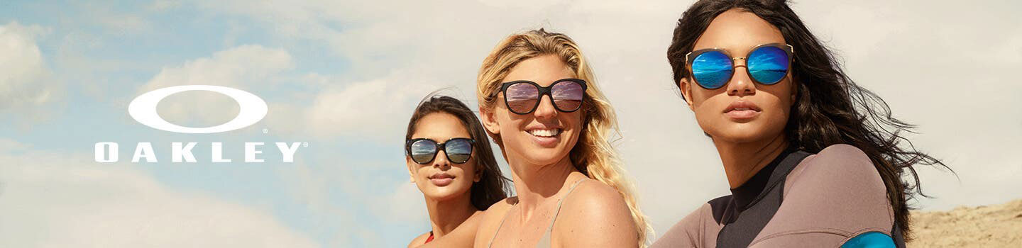 three female wearing Oakley sunglasses
